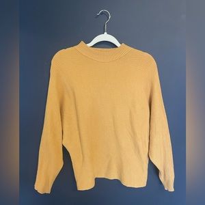 mustard yellow turtleneck sweater